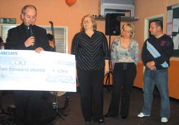 Cheque presentation to CRY 1