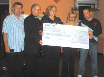 Cheque presentation to CRY 2