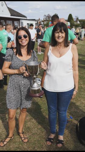 Luke's mum Julie and Lee's wife Sarah with the  Luke Henney memorial cup